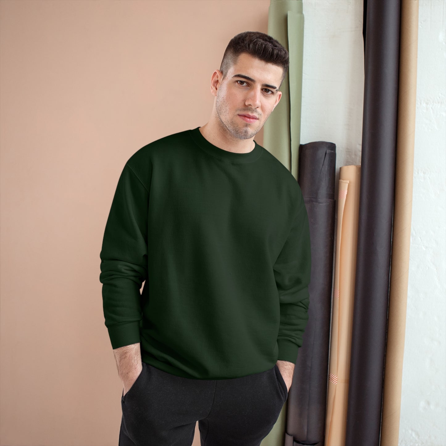 man with a bottle green sweatshirt