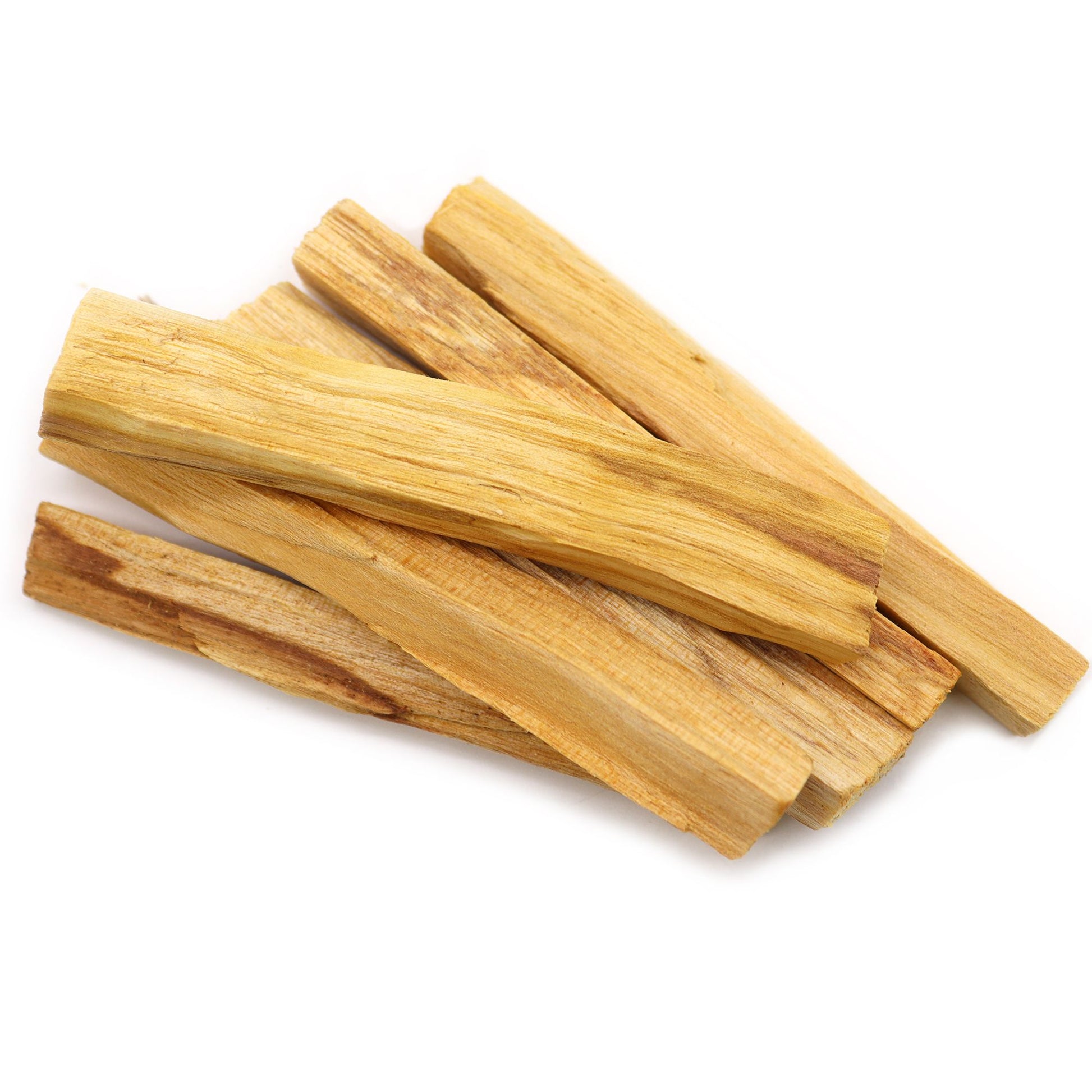 Wooden palo santo sticks on a white background