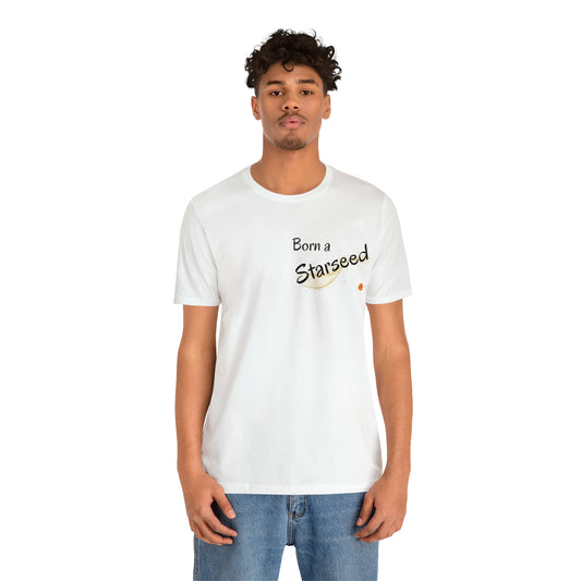 Starseed T-shirt. Man with a white T-shirt that syas Born a starseed