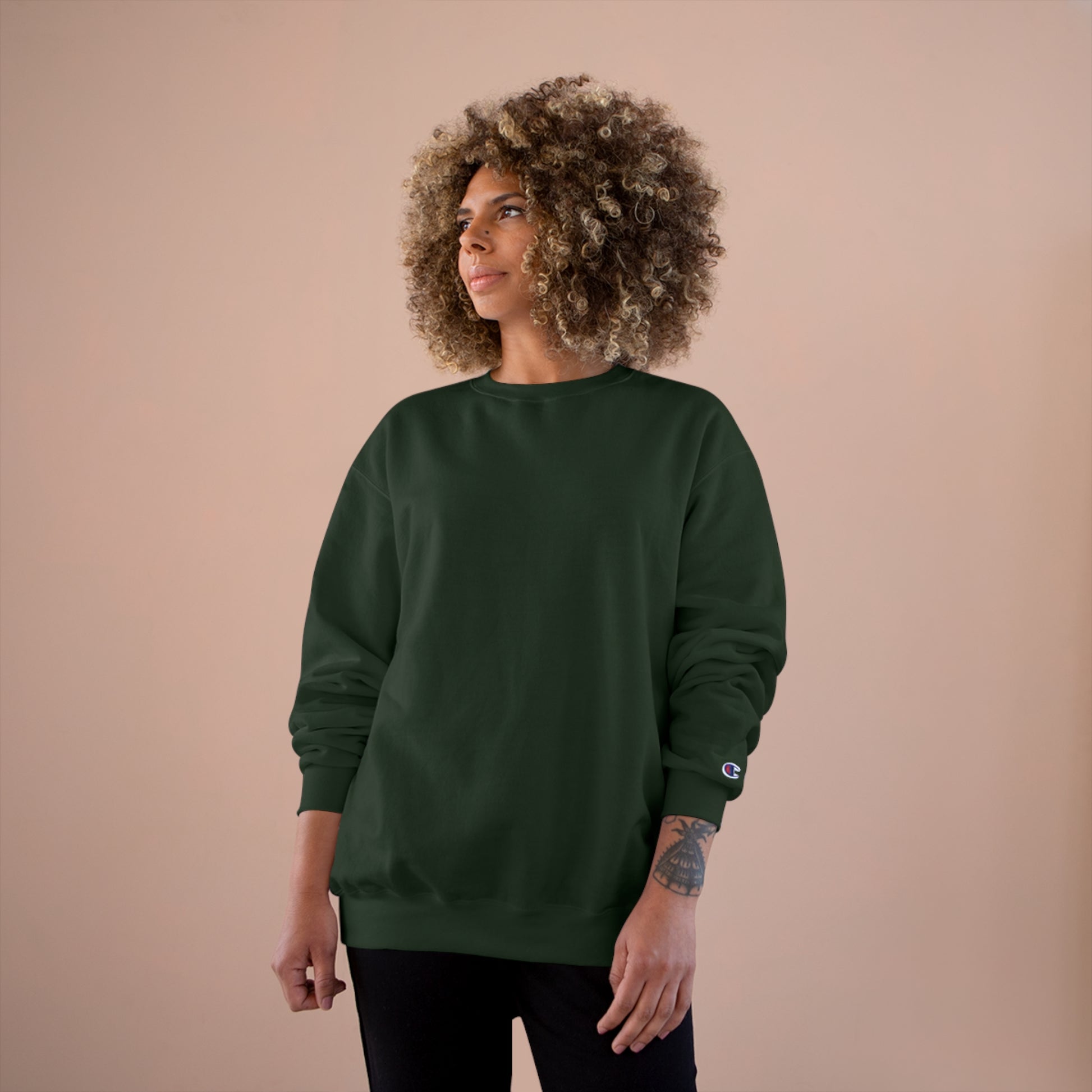 woman with bottle green sweatshirt